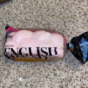 A rare pink english bread squishy.